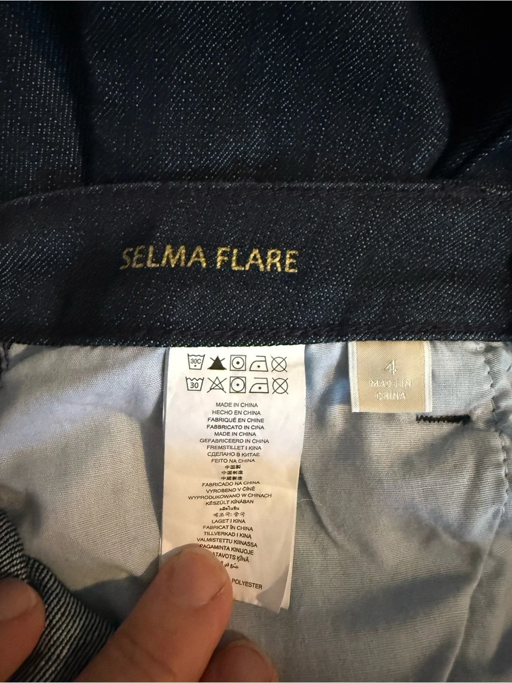 Michael Kors Dark Indigo Wide-Leg Jeans with Gold Hardware